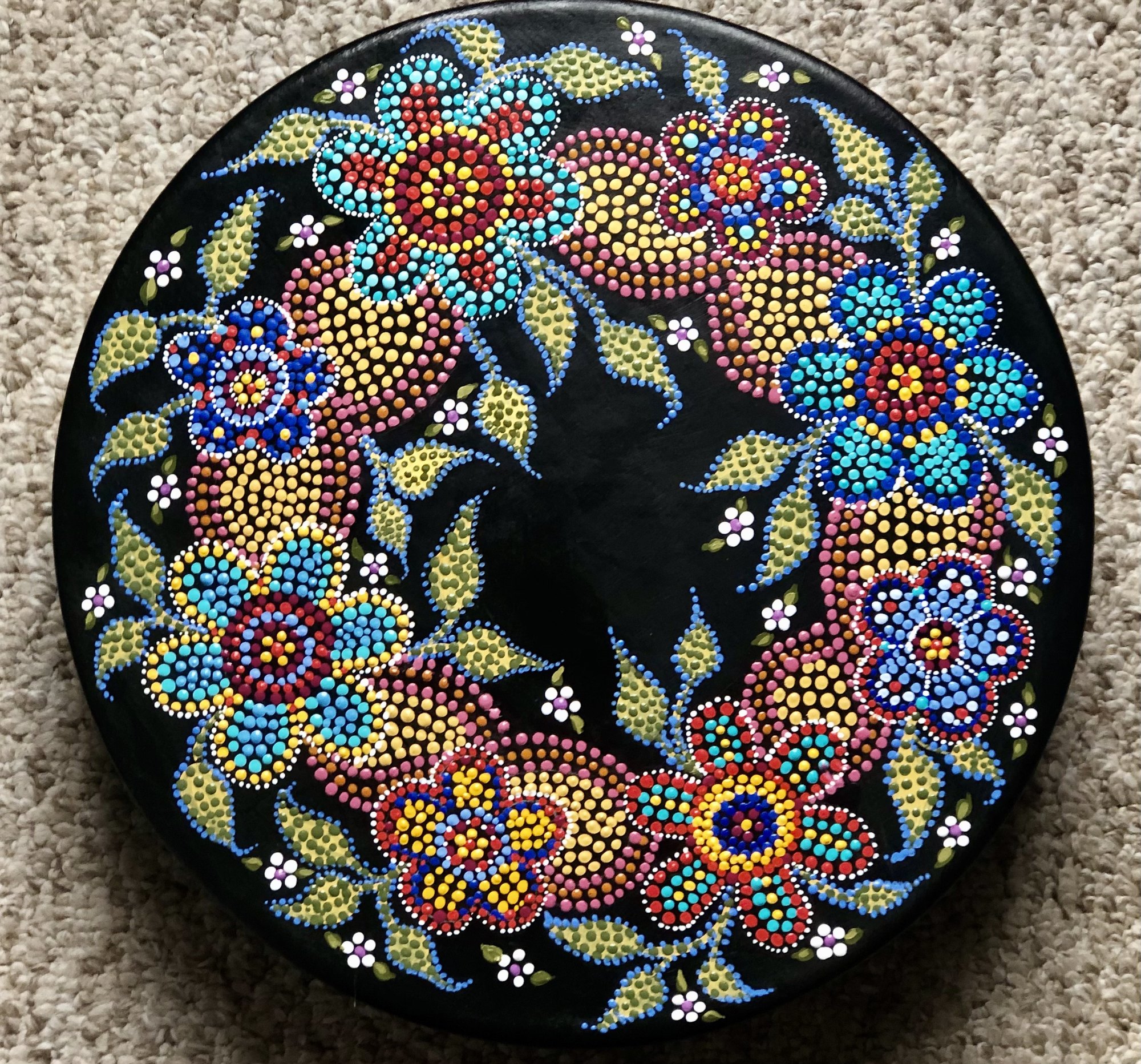Dogwood and Roses, hand-painted healing drum by Sherry Leigh Williams for Métis Nation BC oncology program